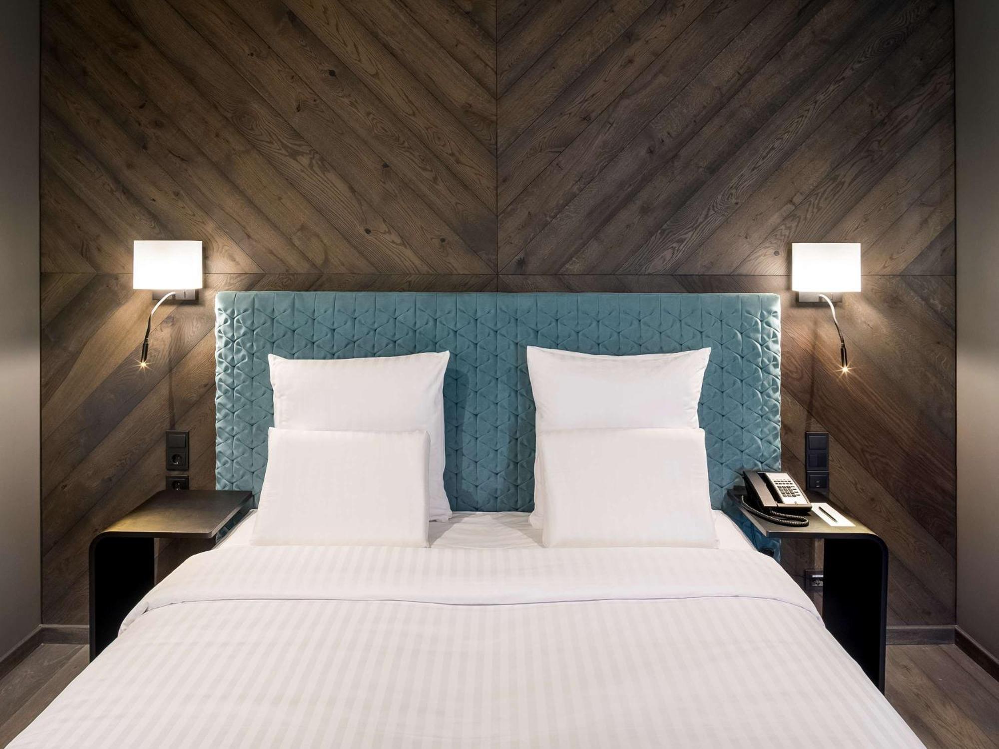 Pullman Riga Old Town Hotel Luaran gambar A bedroom at the hotel